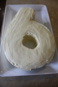 Here's the six cake with a thick coat of cream cheese icing.
